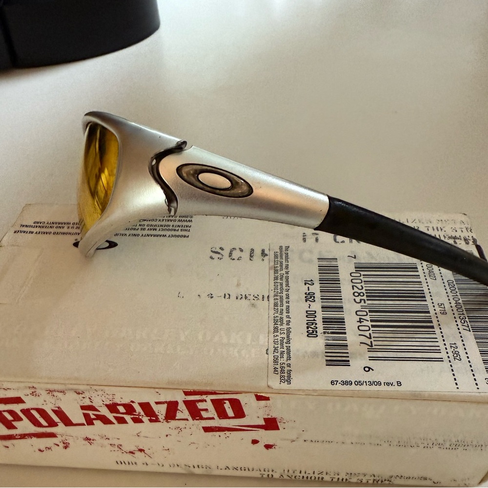 Used Oakley Silver Frame Sunglasses with Orange Lenses